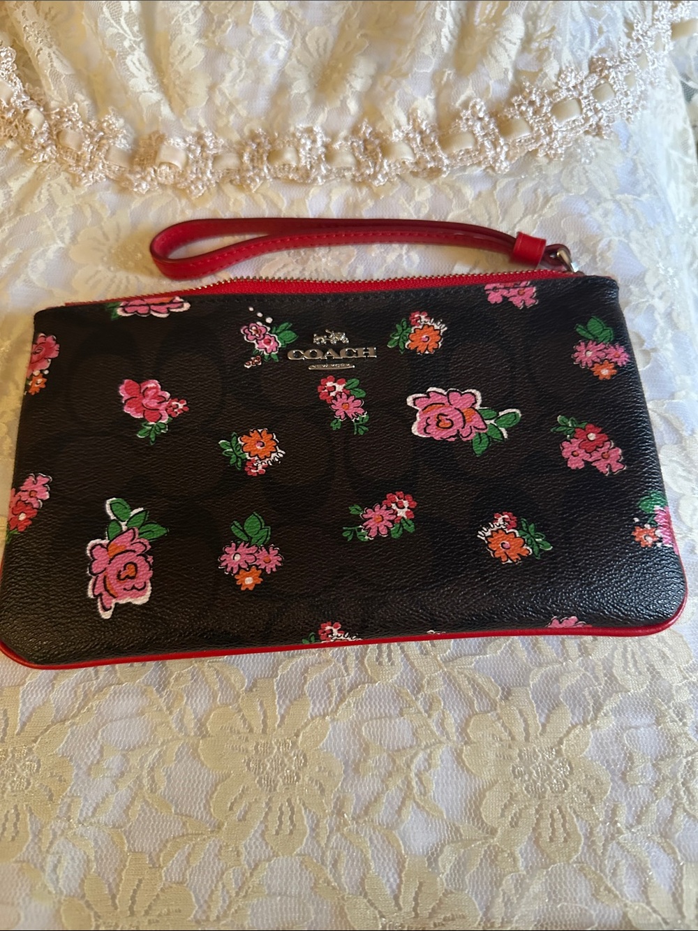 Coach Black Floral Wristlet with Pink Trim